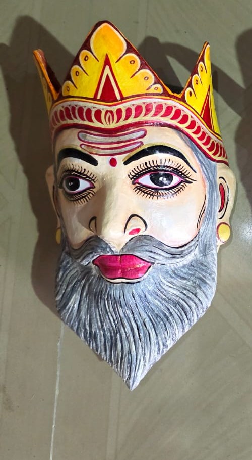 Royal elder mask with a golden crown and flowing grey beard